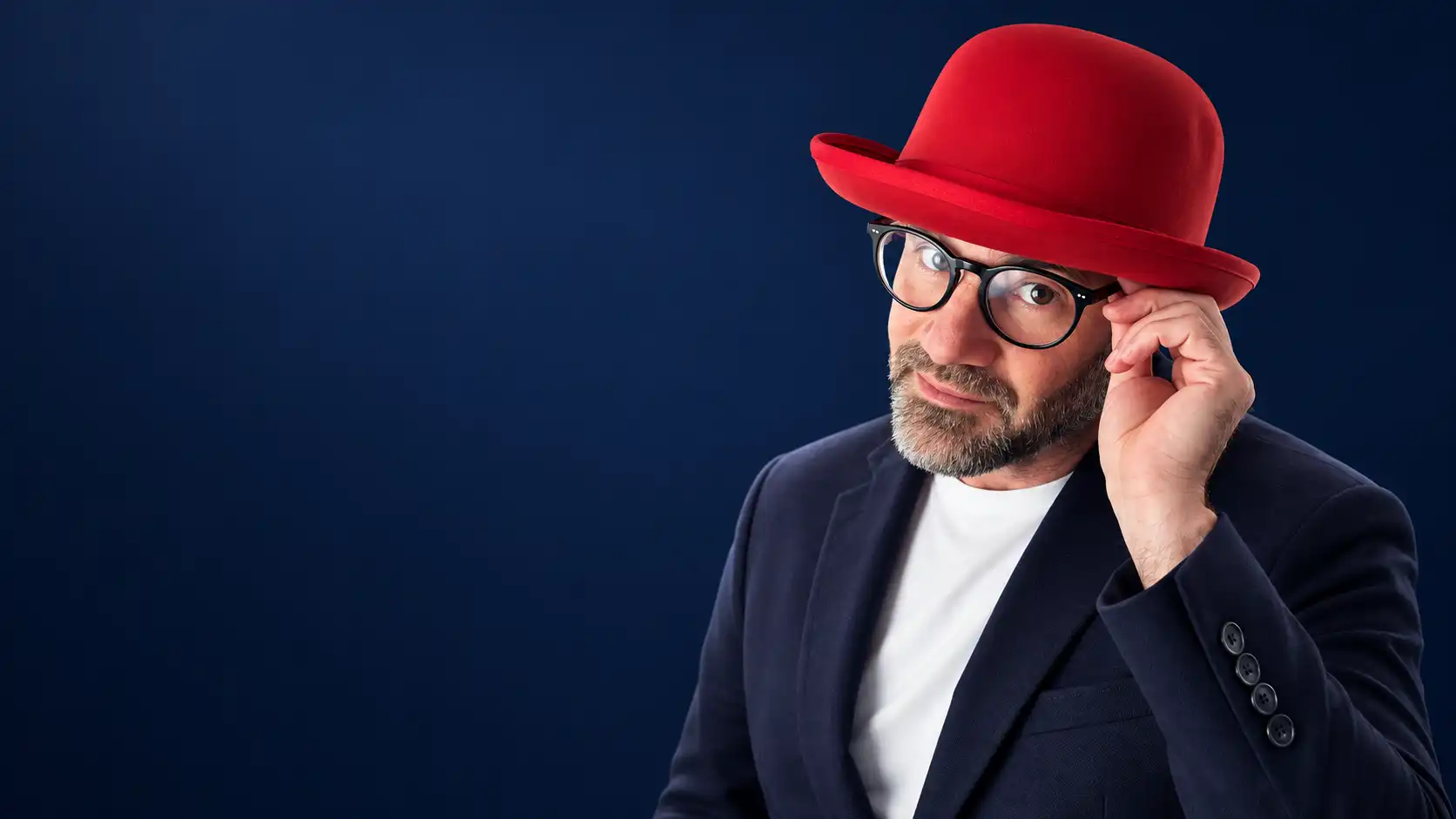 Rafał Kocik wearing a red bowler hat